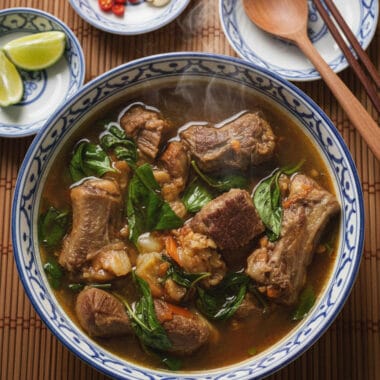 Oxtail basil stew with tender oxtail, beef, green papaya, and fresh basil