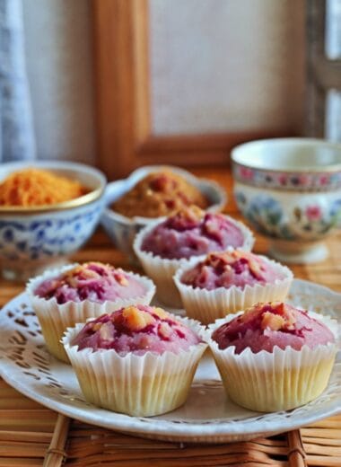 Chinese Sweet Potato Coconut Huat Kueh – fluffy steamed rice cakes made with purple sweet potato and topped with shredded coconut
