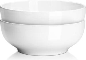White ceramic large bowl filled with soup, suitable for serving family meals