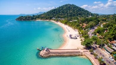 Calm shallow water along Kep Beach, a crescent-shaped public beach in Kep, Cambodia