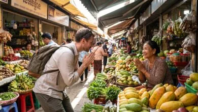 A foreign traveler greets a Cambodian market vendor with hands pressed together in the traditional sampeah gesture