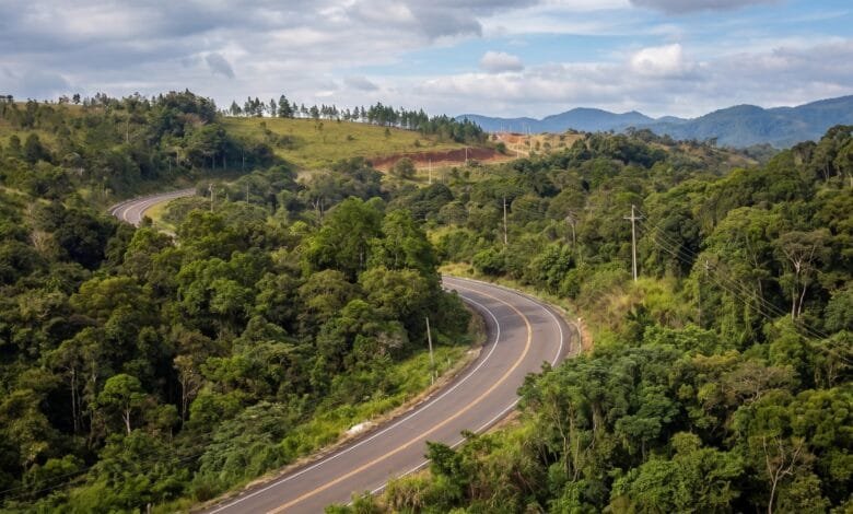 Rolling green hills and forested highland landscape near Sen Monorom in Mondulkiri province, Cambodia