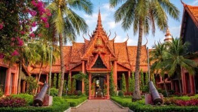 Exterior view of the National Museum of Cambodia in Phnom Penh showing the terracotta building and traditional Khmer roof