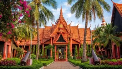 Exterior view of the National Museum of Cambodia in Phnom Penh showing the terracotta building and traditional Khmer roof