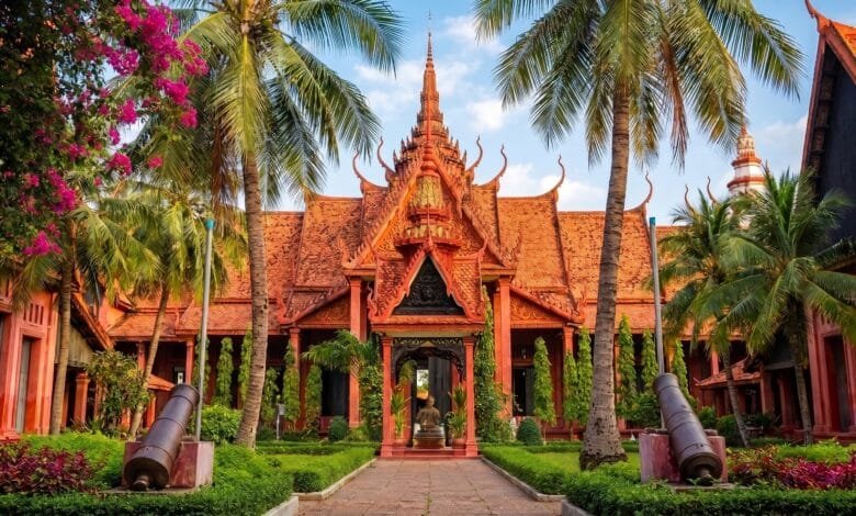 Exterior view of the National Museum of Cambodia in Phnom Penh showing the terracotta building and traditional Khmer roof