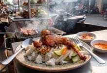 Cambodian grilled chicken and rice breakfast served at a Phnom Penh street food stall
