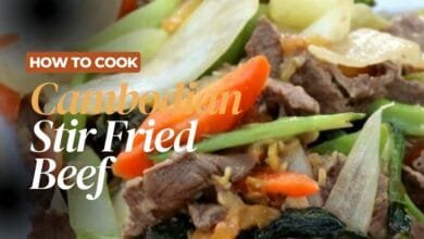 Sizzling Cambodian stir-fried beef cooking in a hot wok