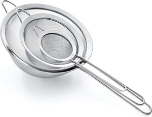 Four fine mesh strainers with different mesh sizes