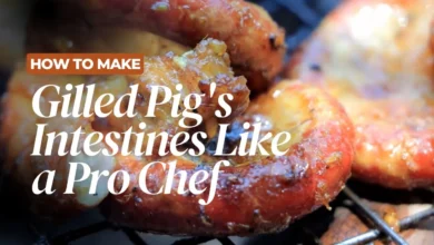 Grilled pig intestines on a plate with chili dipping sauce, a traditional Cambodian recipe
