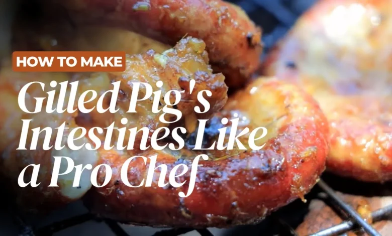Grilled pig intestines on a plate with chili dipping sauce, a traditional Cambodian recipe